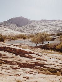 Scenic view of desert against clear sky