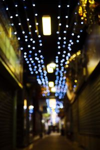 Defocused image of illuminated lights at night