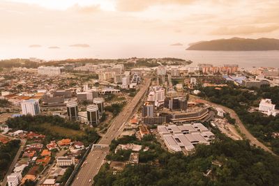 High angle view of buildings in city against sky