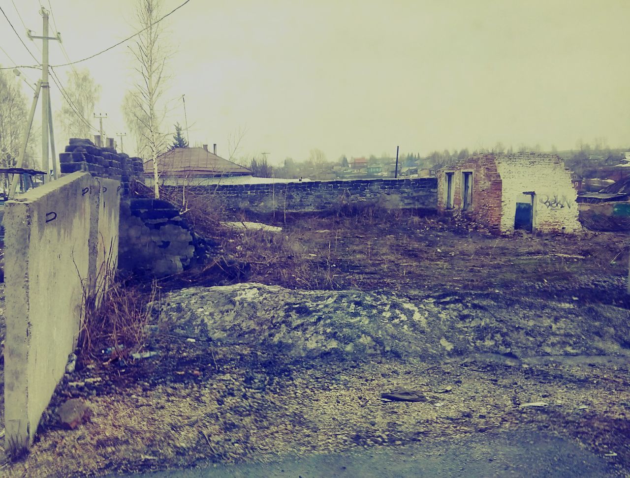 built structure, architecture, building exterior, sky, field, clear sky, grass, abandoned, nature, landscape, house, plant, day, no people, tranquility, outdoors, fence, tranquil scene, old, copy space