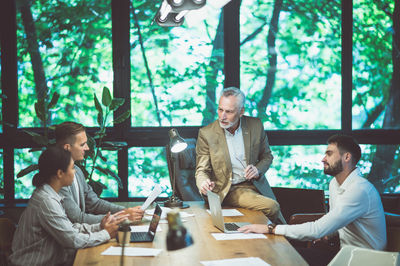 Business colleagues working at office