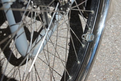 Cropped image of wheelchair on footpath