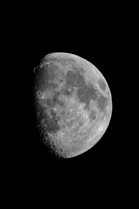 Low angle view of moon against sky at night