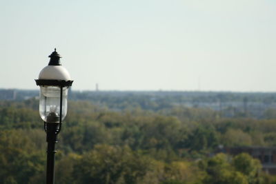 Street light against clear sky