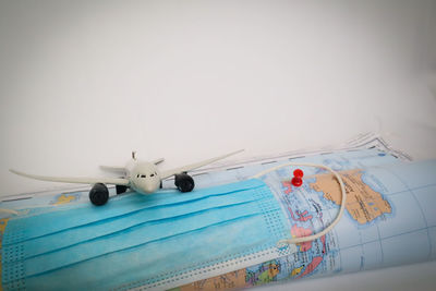 Low angle view of toy in swimming pool against clear sky