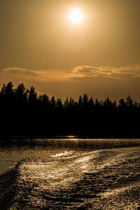 Scenic view of lake during sunset