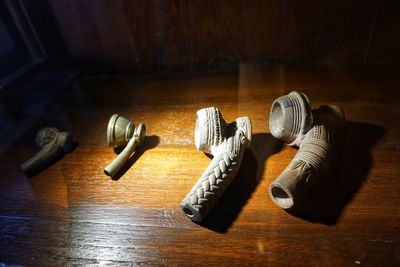 High angle view of shoes on wooden table