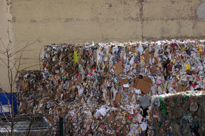 Close-up of garbage against wall
