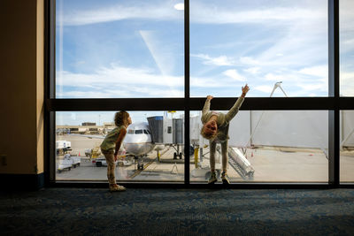 People standing in glass window