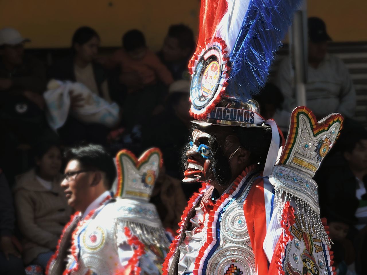 arts culture and entertainment, art and craft, focus on foreground, multi colored, tradition, cultures, celebration, creativity, indoors, leisure activity, men, art, close-up, animal representation, night, amusement park, selective focus, incidental people, lifestyles