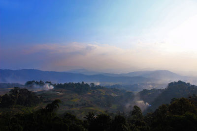 Scenic view of mountains against sky during sunset