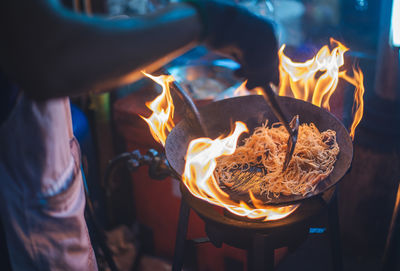 Midsection of man preparing food