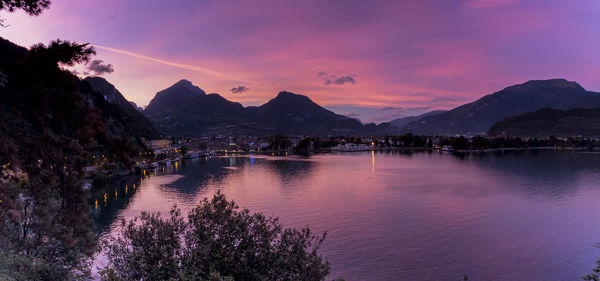 Scenic view of lake against sky during sunset