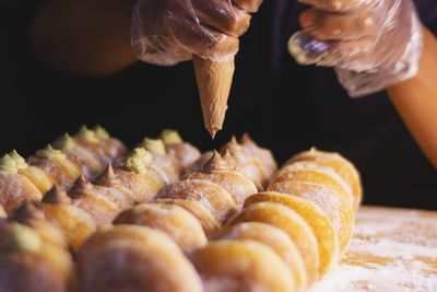 Close-up of person preparing food