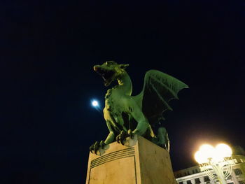 Low angle view of built structure at night