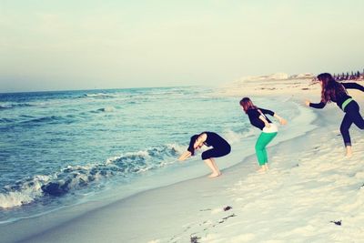 People enjoying at beach