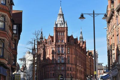 Low angle view of buildings against sky