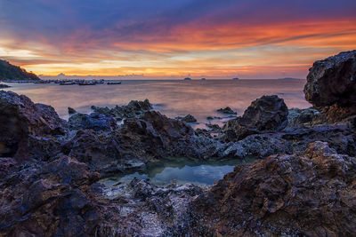 Scenic view of sea against sky during sunset