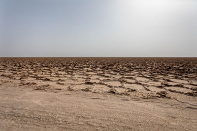 Scenic view of desert against clear sky