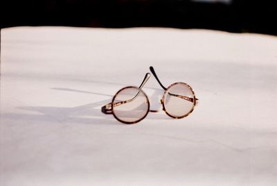Close-up of eyeglasses on table