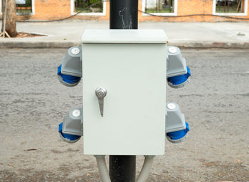 Close-up of garbage bin in park