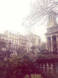 Built structure with trees in foreground