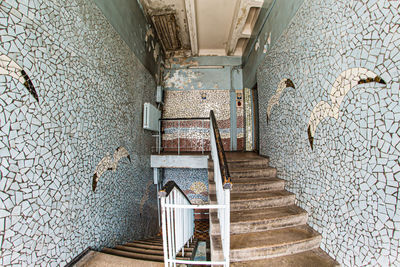 High angle view of staircase in abandoned building