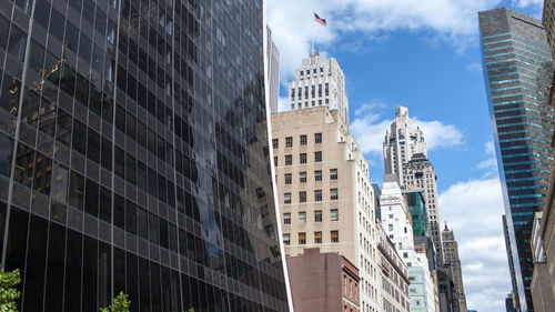 Low angle view of skyscrapers in city