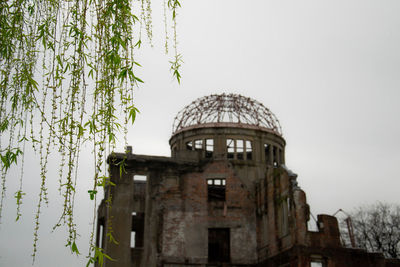 Low angle view of old building against sky