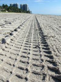 Tire tracks on sand