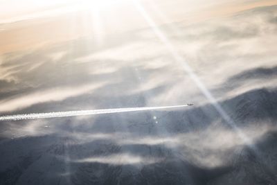 Aerial view of vapor trails in sky