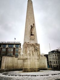 Statue of historic building against sky