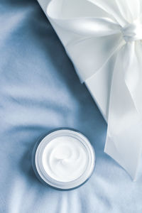 High angle view of wedding rings on table