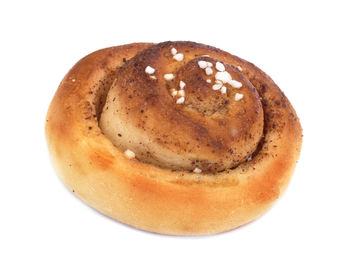 Close-up of bread against white background