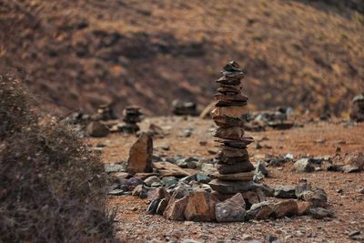 Stack of stones on field