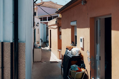 Alley amidst house in town