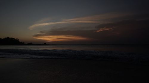 Scenic view of sea against sky at sunset