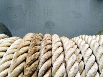 Close-up of rope tied on wall