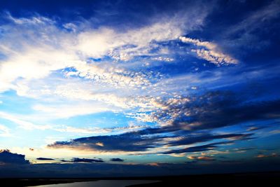 Low angle view of cloudy sky during sunset