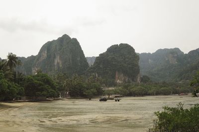 Scenic view of mountains surrounding bay