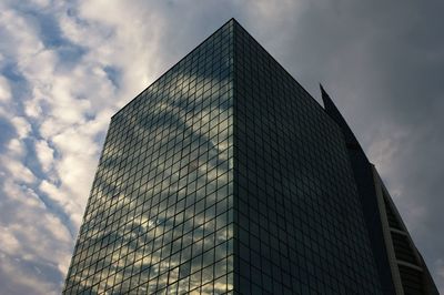 Low angle view of modern building against sky