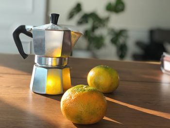 Close-up of fruits on table at home