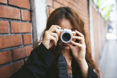 Portrait of man photographing