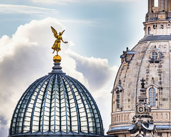 Low angle view of statue of building against sky