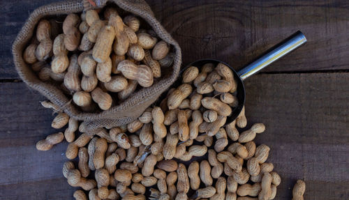 High angle view of roasted coffee beans on table