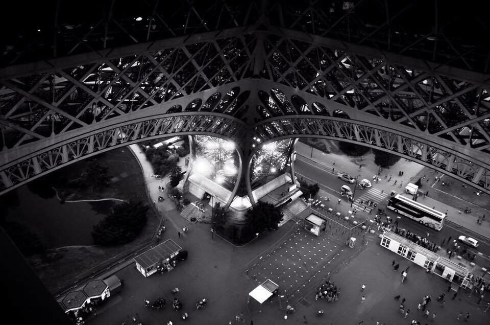 AERIAL VIEW OF CROWD IN ILLUMINATED CITY