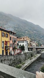 River by mountains against sky