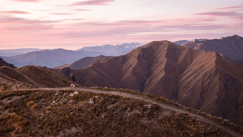 Scenic view of mountains against sky during sunset