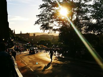 People walking on road in city