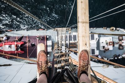 Low section of man on sailboat